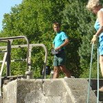 Lockkeeper uses high-tech wireless controls while Pat works the low-tech lines.