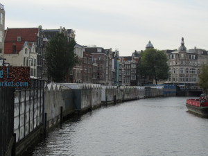 The back of the barges holding the stalls of the flower market