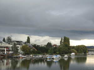 We watch as the clouds begin to get angry over the river