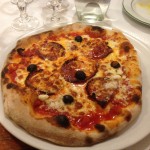 Pizza with Chorizo, onion and olives