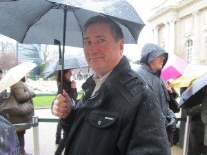 A rainy day in line at the Grand Palace